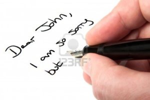 7111402-a-male-hand-writing-a-dear-john-letter
